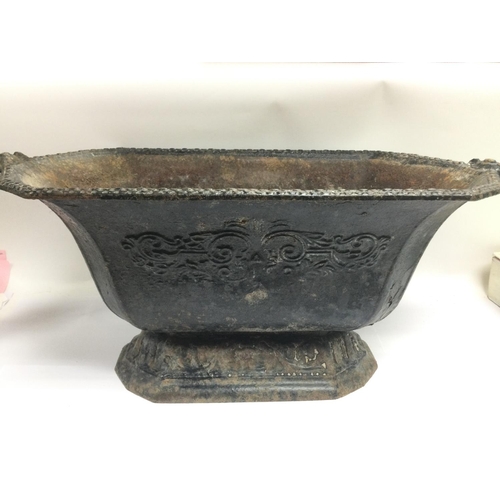 1722 - A cast iron Victorian planter, approx width 58.5cm. Possible foundry mark to one of the handles. Shi... 