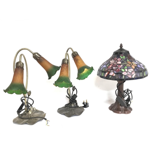 1725 - Three electric table lamps consisting of two glass & metal lily pad lamps and a Tiffany style lamp, ... 