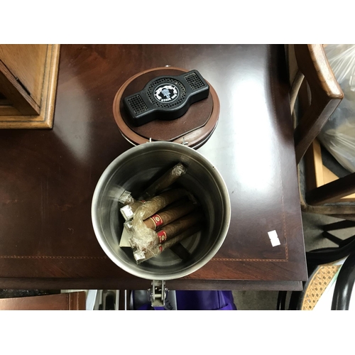 1744 - Oak smokers cabinet with a tin of cigars, Shipping category C.