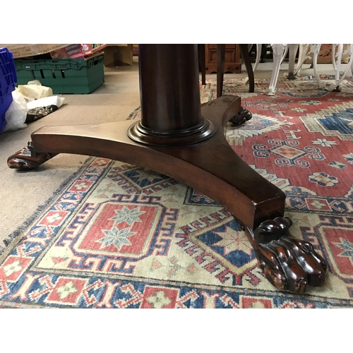 1749 - A round Victorian mahogany dining table with claw feet and six reproduction chairs. Shipping categor... 