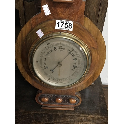 1758 - A walnut cased barometer length 62cm