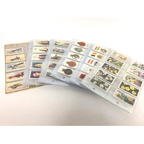 2011 - A collection of approximately 30 full sets of well presented cigarette cards including Players, Will... 