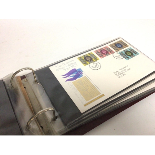 2013 - A collection of first day covers displayed in albums