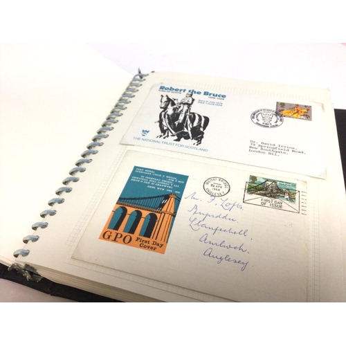 2013 - A collection of first day covers displayed in albums