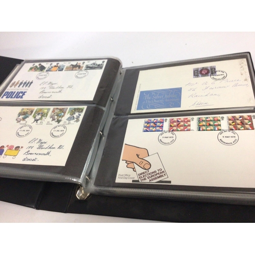 2013 - A collection of first day covers displayed in albums