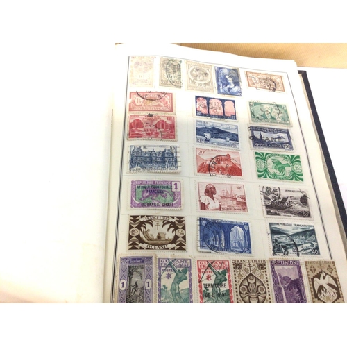 2015 - Two album containing a stamps from GB and worldwide. Postage B.