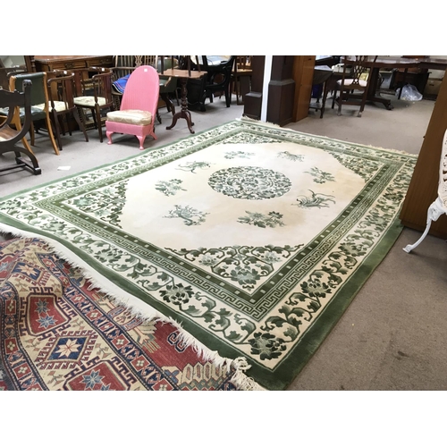 2429 - Chinese green and cream carpet , 8x14 foot approximately. postage cat D