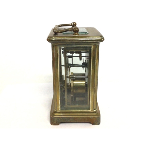 805 - Bronze Bracket clock, with key. Made in France. Postage cat D. Seen working. 11cm tall approximately... 