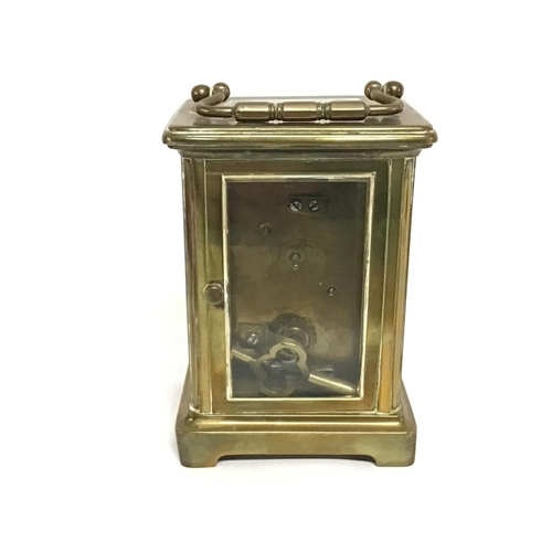 805 - Bronze Bracket clock, with key. Made in France. Postage cat D. Seen working. 11cm tall approximately... 