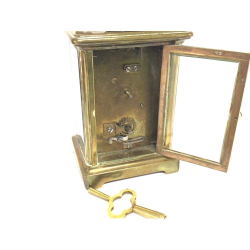 805 - Bronze Bracket clock, with key. Made in France. Postage cat D. Seen working. 11cm tall approximately... 