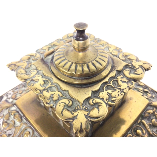 811 - Victorian square brass desk inkwell with hinged lid. 19cm tall. Postage cat B