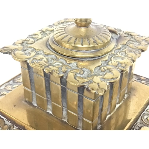 811 - Victorian square brass desk inkwell with hinged lid. 19cm tall. Postage cat B