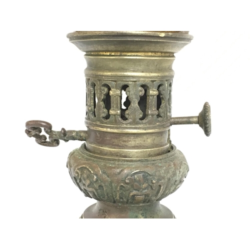 815 - Old bronze Cloissone styled enabled three sectioned oil lamp with yellow crackle glass shade, approx... 