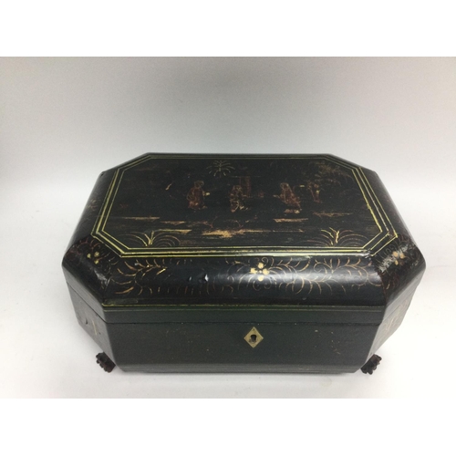 830 - A Chinese lacquered sewing box, approx 27cm x 20cm x 12.5cm. Shipping category C.