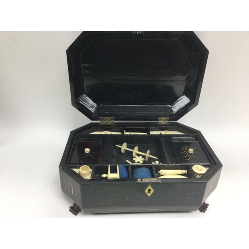 830 - A Chinese lacquered sewing box, approx 27cm x 20cm x 12.5cm. Shipping category C.