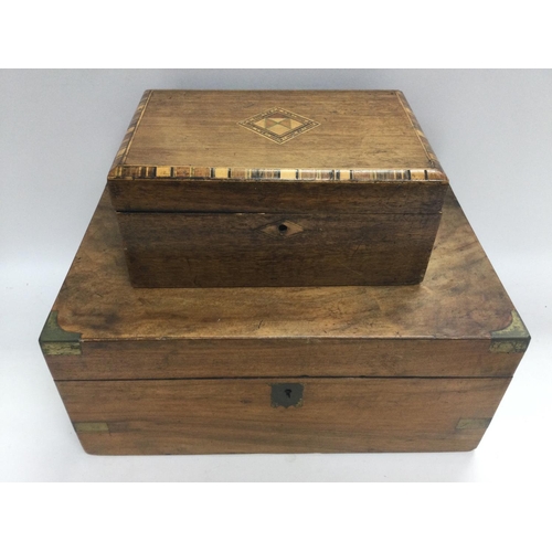 841 - A walnut writing slope and a small inlaid box (2). Shipping category C.