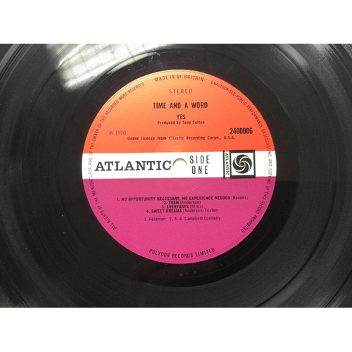 12 - A first UK pressing of the 'Time And A Word' LP by Yes, 2400006 on red/plum Atlantic labels. Some ha... 