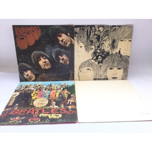 134 - A Beatles numbered 'White Album', 0125388, lacking inserts and black inners, together with three oth... 