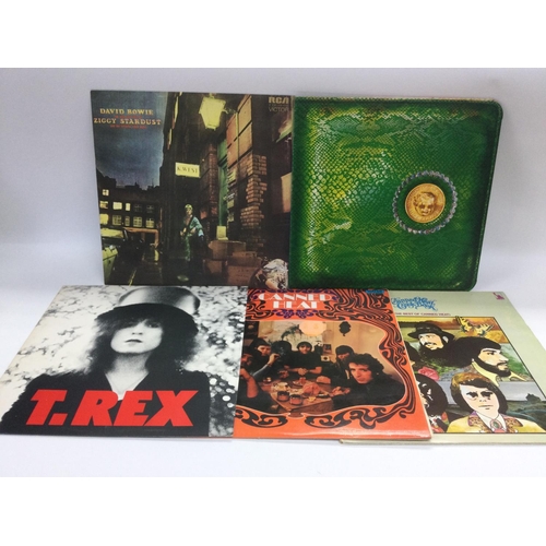 143 - Five rock LPs by various artists including Alice Cooper, David Bowie, T Rex and Canned Heat.