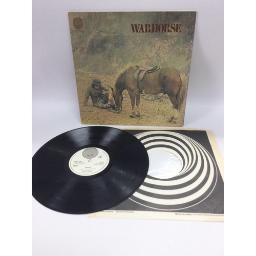 153 - An early UK pressing of the self titled 'Warhorse' LP, 6360 015 in ex condition.