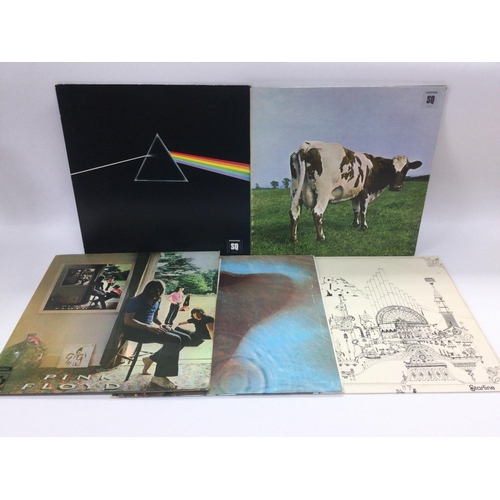 154 - Five Pink Floyd LPs including two Quadrophonic pressings of 'Dark Side Of The Moon' and 'Atom Heart ... 