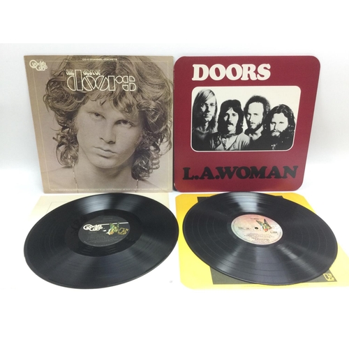 156 - Two LPs by The Doors comprising a Quadrophonic pressing of 'The Best Of The Doors' and a later copy ... 