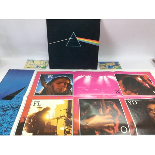 174 - A first UK pressing of 'Dark Side Of The Moon' by Pink Floyd with solid blue triangle centre label, ... 