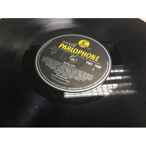 194 - Three early UK pressings of Beatles LPs comprising a mono 'Revolver', 'Help!' and 'Rubber Soul'. Som... 