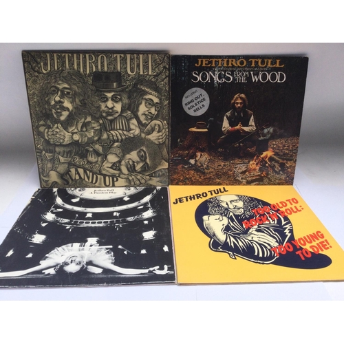 268 - Four Jethro Tull LPs comprising 'Stand Up', 'Songs From The Wood', 'A Passion Play' and 'Too Old To ... 