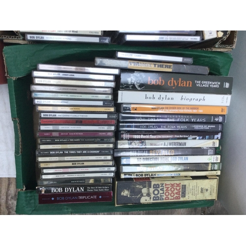 276 - Three boxes of Bob Dylan CDs and DVDs.