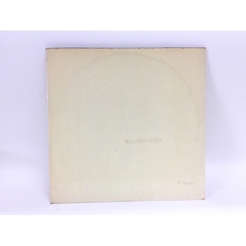 28 - A numbered Beatles 'White Album', no. 0332445, top loading and complete with black inner sleeves, fo... 