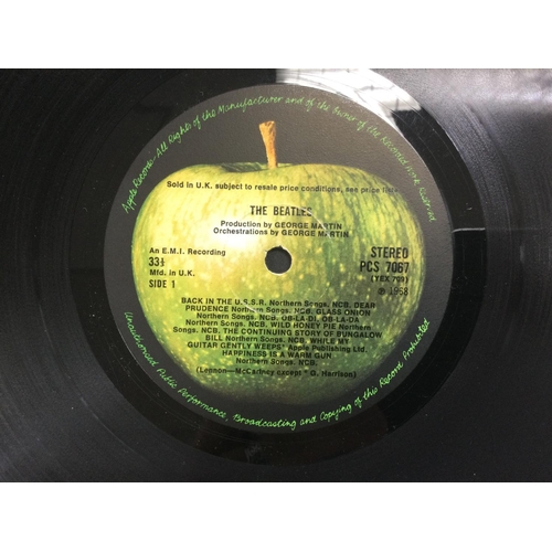 28 - A numbered Beatles 'White Album', no. 0332445, top loading and complete with black inner sleeves, fo... 