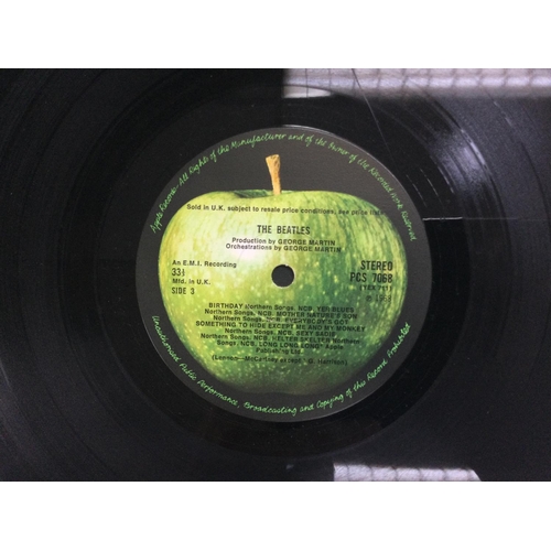 28 - A numbered Beatles 'White Album', no. 0332445, top loading and complete with black inner sleeves, fo... 