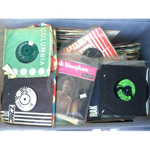 281 - A plastic crate containing 7inch singles and EPs by various artists from the 1960s onwards including... 