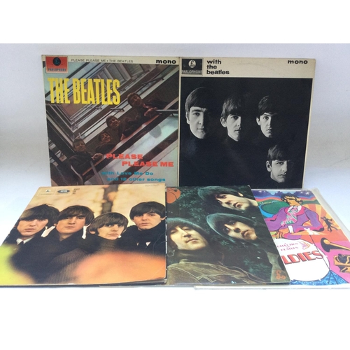 283 - Five early UK pressings of Beatles LPs comprising 'Please Please Me', black and yellow Parlophone la... 