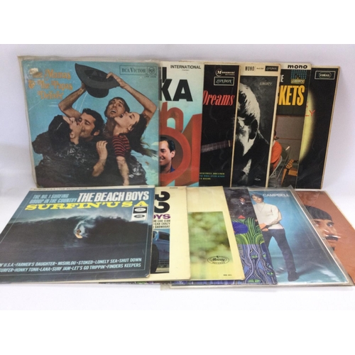 285 - A collection in two bags of 21 LPs by artists from the 1960s including The Beach Boys, Sony & Cher, ... 