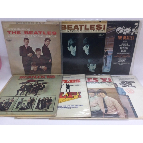 30 - Seven US pressings of Beatles LPs including 'Meet The Beatles', 'Yesterday And Today' (not a butcher... 