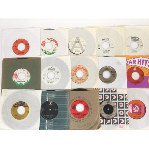 309 - A collection of rockabilly and rock n roll 7inch singles including some promos.