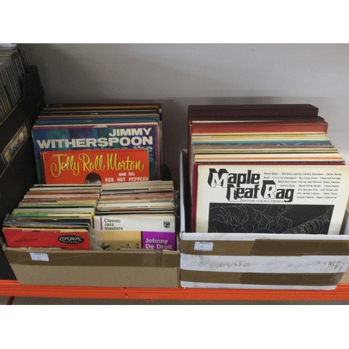 317 - Two boxes of jazz and blues LPs, EPs and 10inch records.