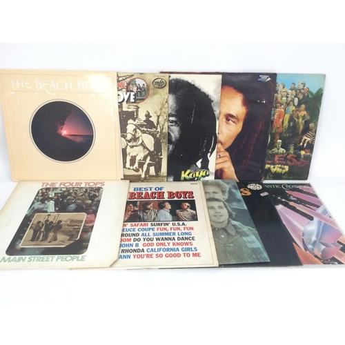 322 - Ten LPs by various artists including The Beatles, Bob Marley and others.