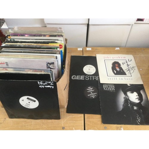 325 - A box of pop and soul LPs snd 12inch singles including a promo record for MC Hammer, a signed Jaki G... 