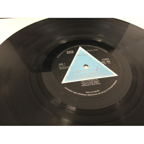 342 - A first UK pressing of 'Dark Side Of The Moon' by Pink Floyd with solid blue triangle label. Later s... 