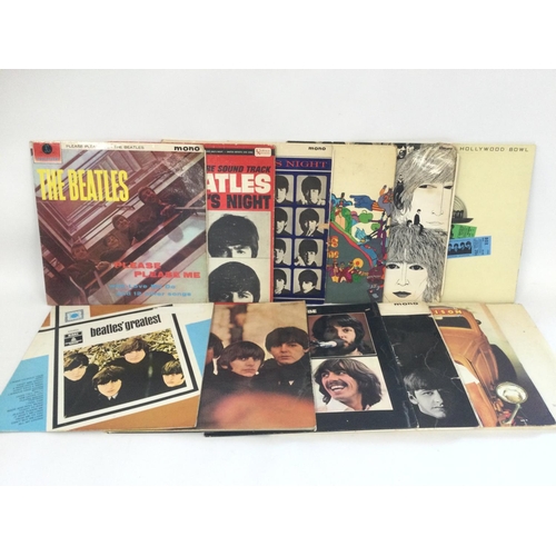 382 - Twelve Beatles and related LPs including foreign pressings and a numbered 'White Album', 0345916.