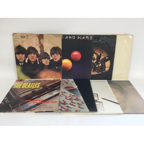 385 - Eight Beatles and related LPs including a numbered 'White Album', 0495272.