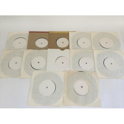 393 - Twelve white label 7inch singles.