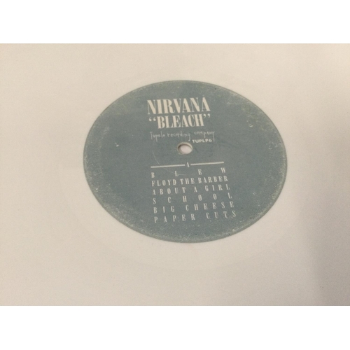 399 - A limited edition white vinyl 'Bleach' LP by Nirvana. Believed to be one of the first UK white vinyl... 