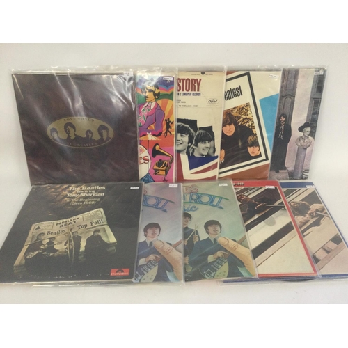 401 - A collection in two bags of Beatles compilation LPs including 'Rock n Roll Music' Volumes 1&2, 'Hey ... 