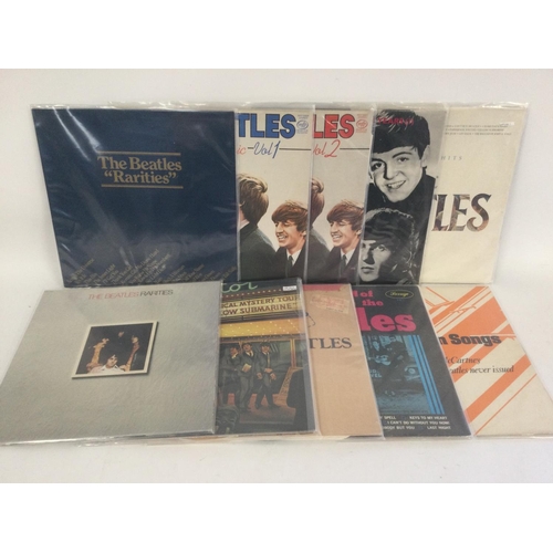 401 - A collection in two bags of Beatles compilation LPs including 'Rock n Roll Music' Volumes 1&2, 'Hey ... 