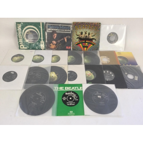 403 - A collection of Beatles and related 7inch singles and EPs.