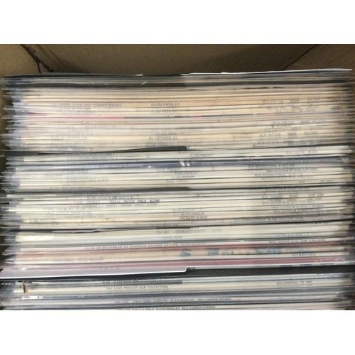 445 - Two boxes containing a large collection of Elvis Presley LPs.